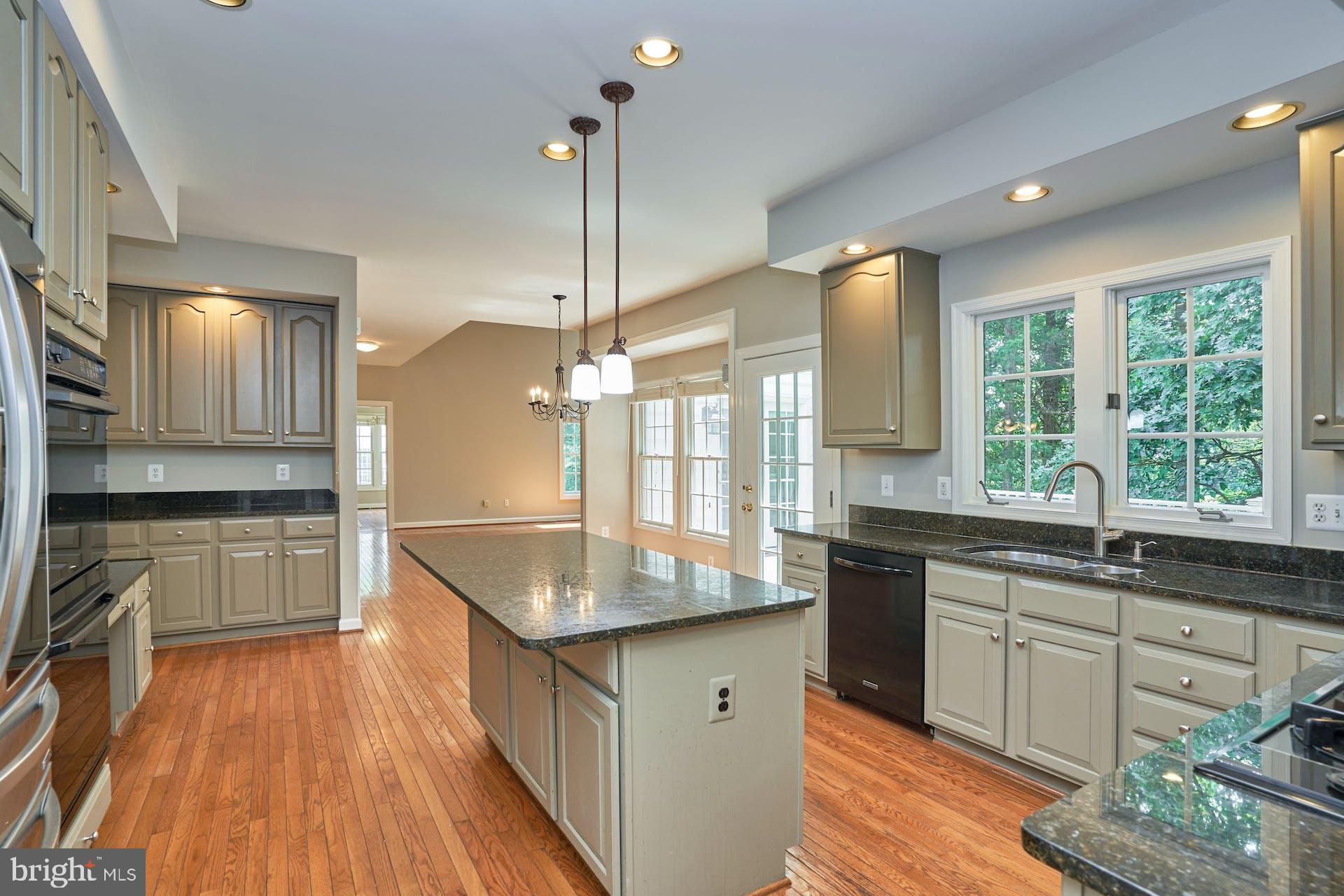 14241 Clubhouse Road Gainesville, VA 20155 - Photo 15 of 62 Kitchen island for entertaining