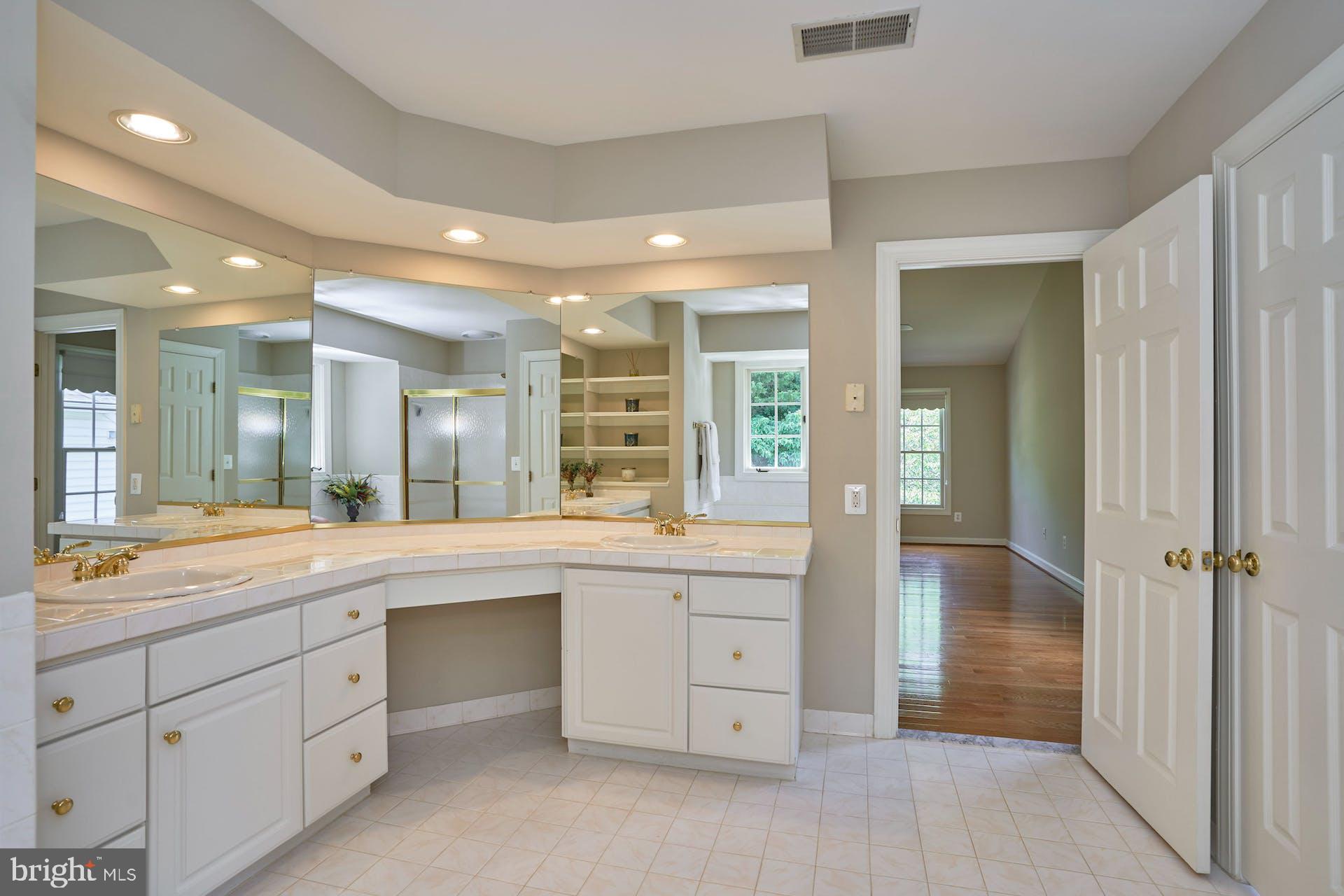 14241 Clubhouse Road Gainesville, VA 20155 - Photo 31 of 62 Dual sinks and vanity area