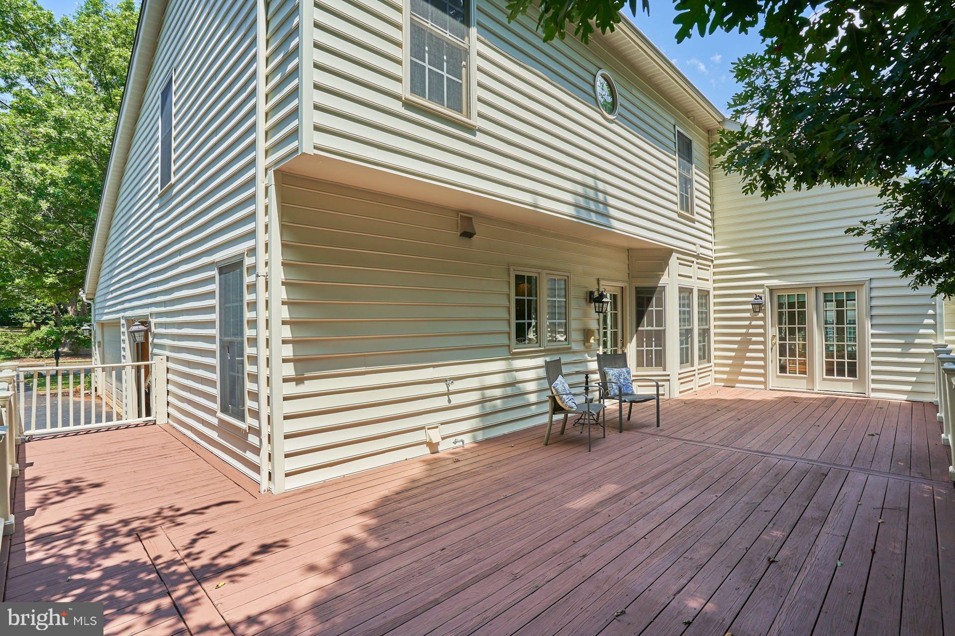 14241 Clubhouse Road Gainesville, VA 20155 - Photo 49 of 62 Wrap around deck to garage