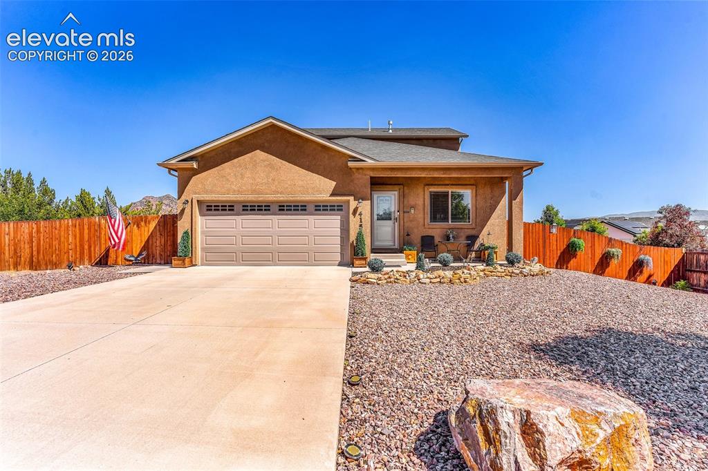 415 Empire Road Canon City, CO 81212 - Photo 2 of 40 a view of a house with basketball court