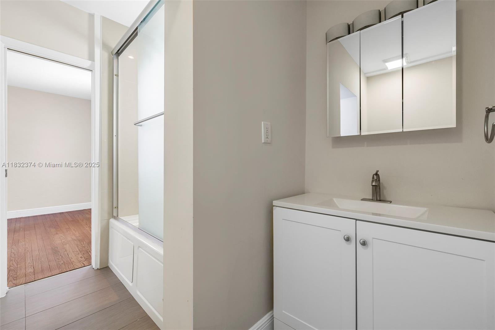 340 Southwest 25th Road Miami, FL 33129 - Photo 24 of 42 a view of a kitchen from the hallway