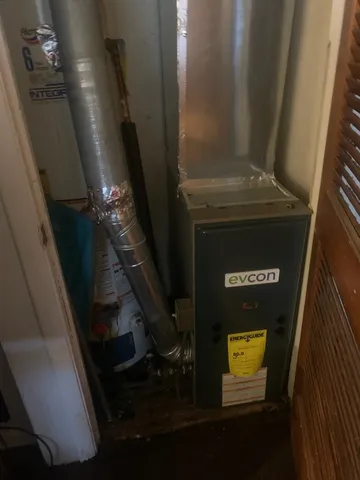 a bathroom with a bathtub and toilet