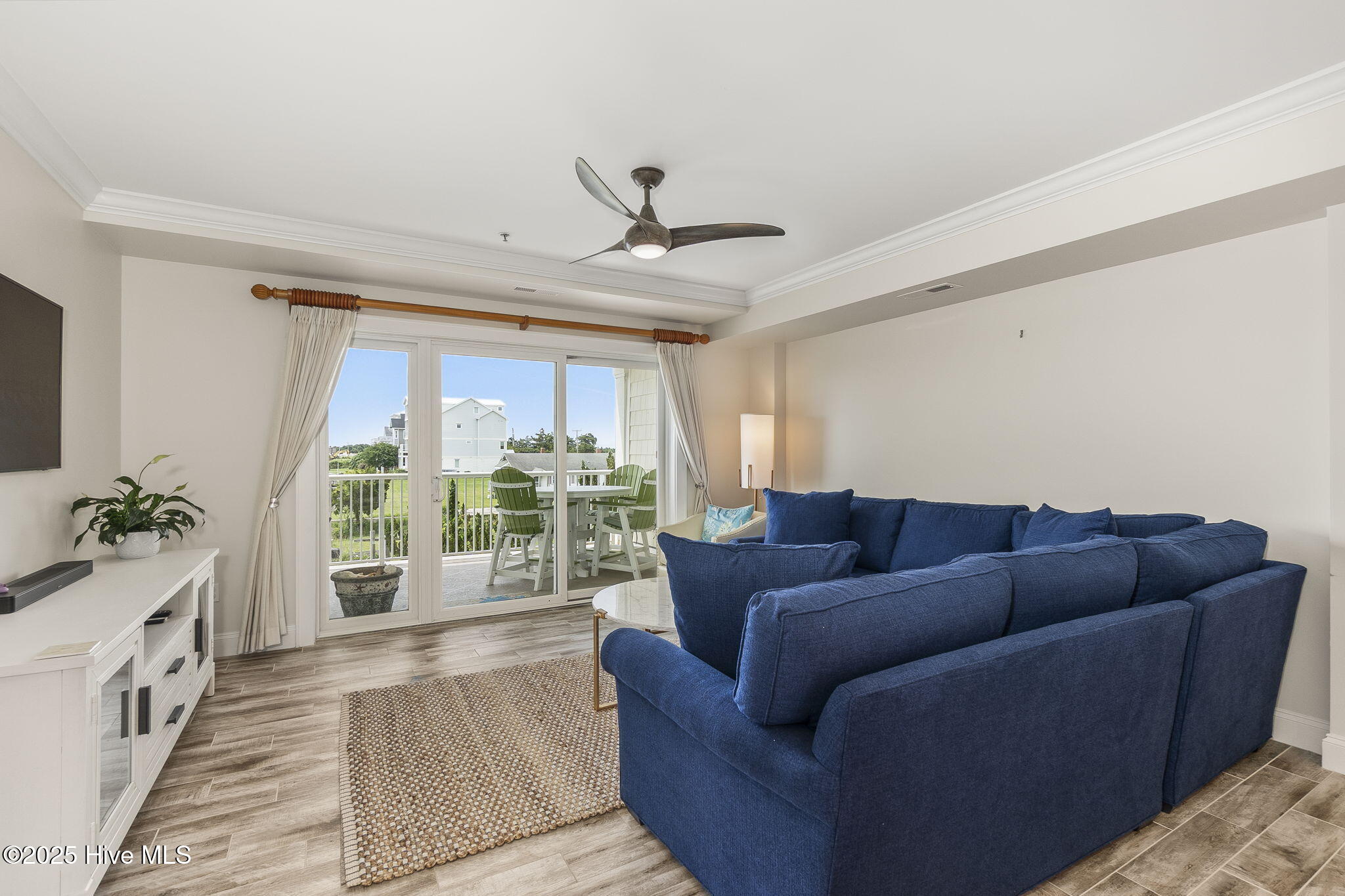 212 Old Causeway Road, Unit 107 & B13 SLIP Beaufort, NC 28516 - Photo 14 of 50 Living room with water views