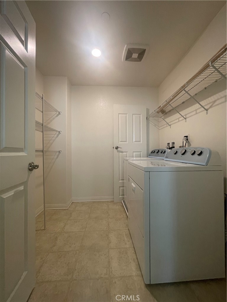 2076 East Bulletin Privado Ontario, CA 91764 - Photo 11 of 20 a room with storage and utility