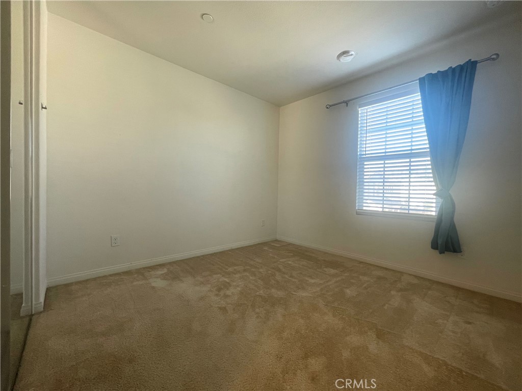 2076 East Bulletin Privado Ontario, CA 91764 - Photo 17 of 20 an empty room with a window