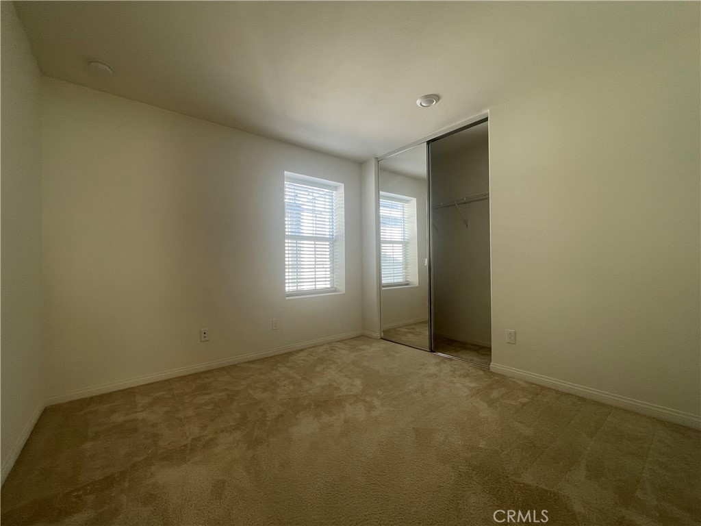 2076 East Bulletin Privado Ontario, CA 91764 - Photo 18 of 20 an empty room with windows