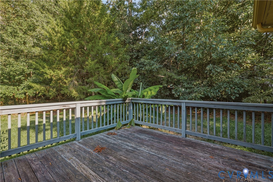 7660 Varann Road Henrico, VA 23231 - Photo 25 of 29 Outdoor wood deck with railing and surrounding mat