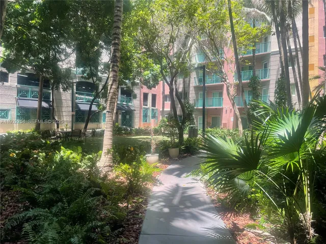 a view of a lake with a building in the background