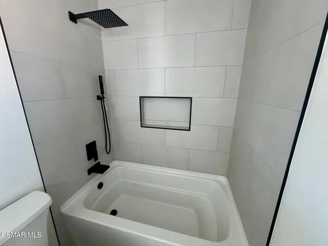 a bathroom with a bathtub