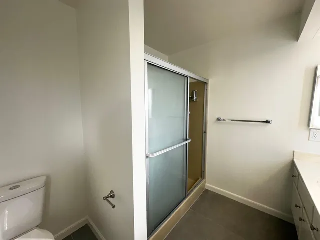 a bathroom with a toilet and a sink