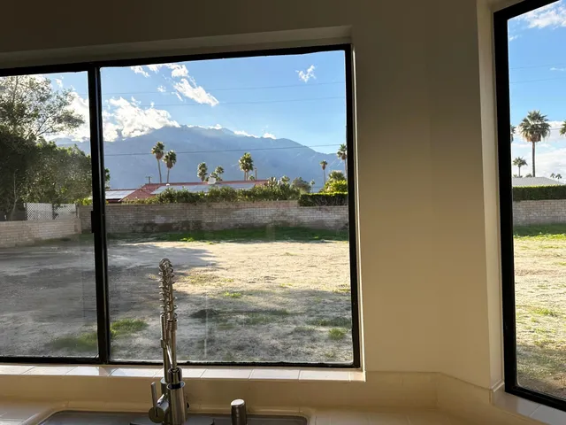 a view of a glass door and porch