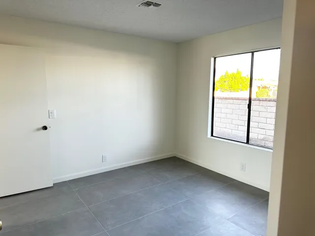 an empty room with a window