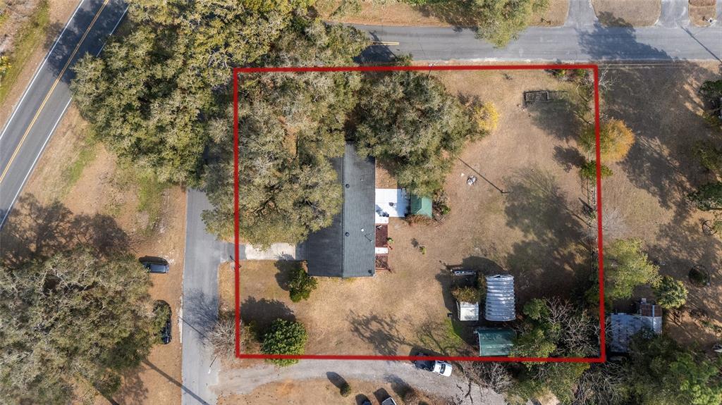 20934 3rd Avenue Dunnellon, FL 34431 - Photo 1 of 33 an aerial view of residential houses with outdoor space