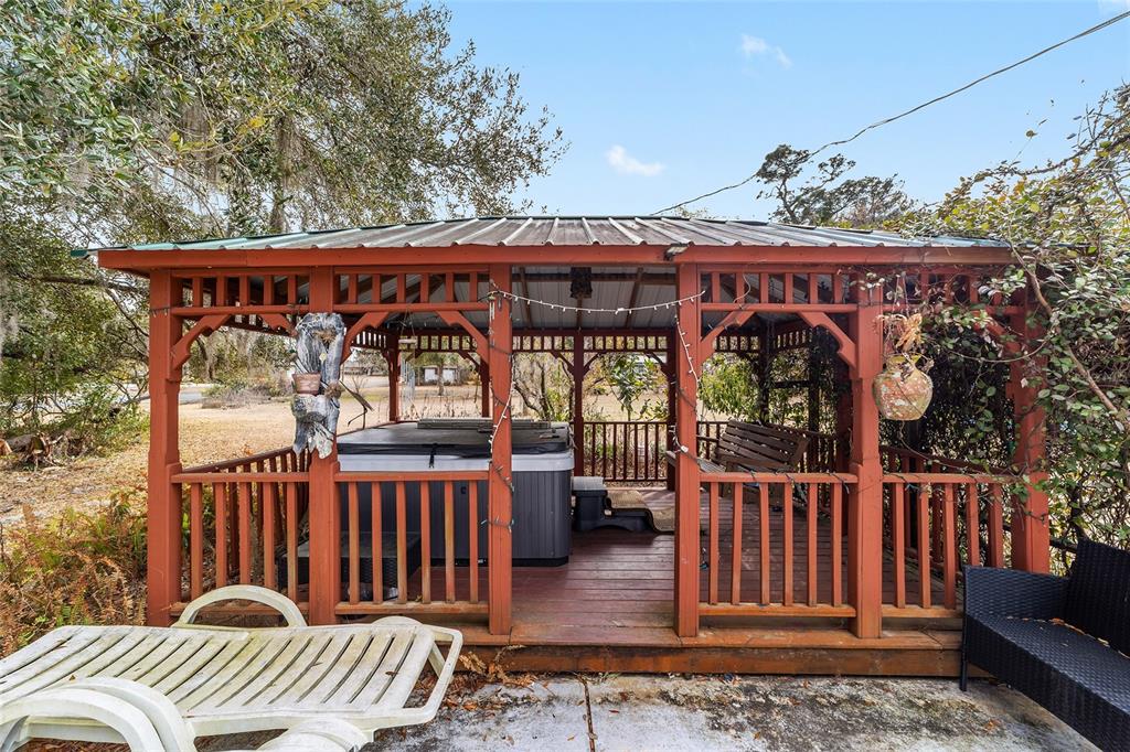 20934 3rd Avenue Dunnellon, FL 34431 - Photo 24 of 33 a view of a chair and table of the house