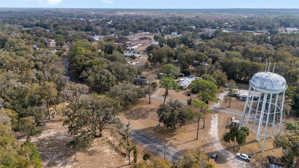 20934 3rd Avenue Dunnellon, FL 34431 - Photo 29 of 33 an aerial view of a house with a yard and lake view