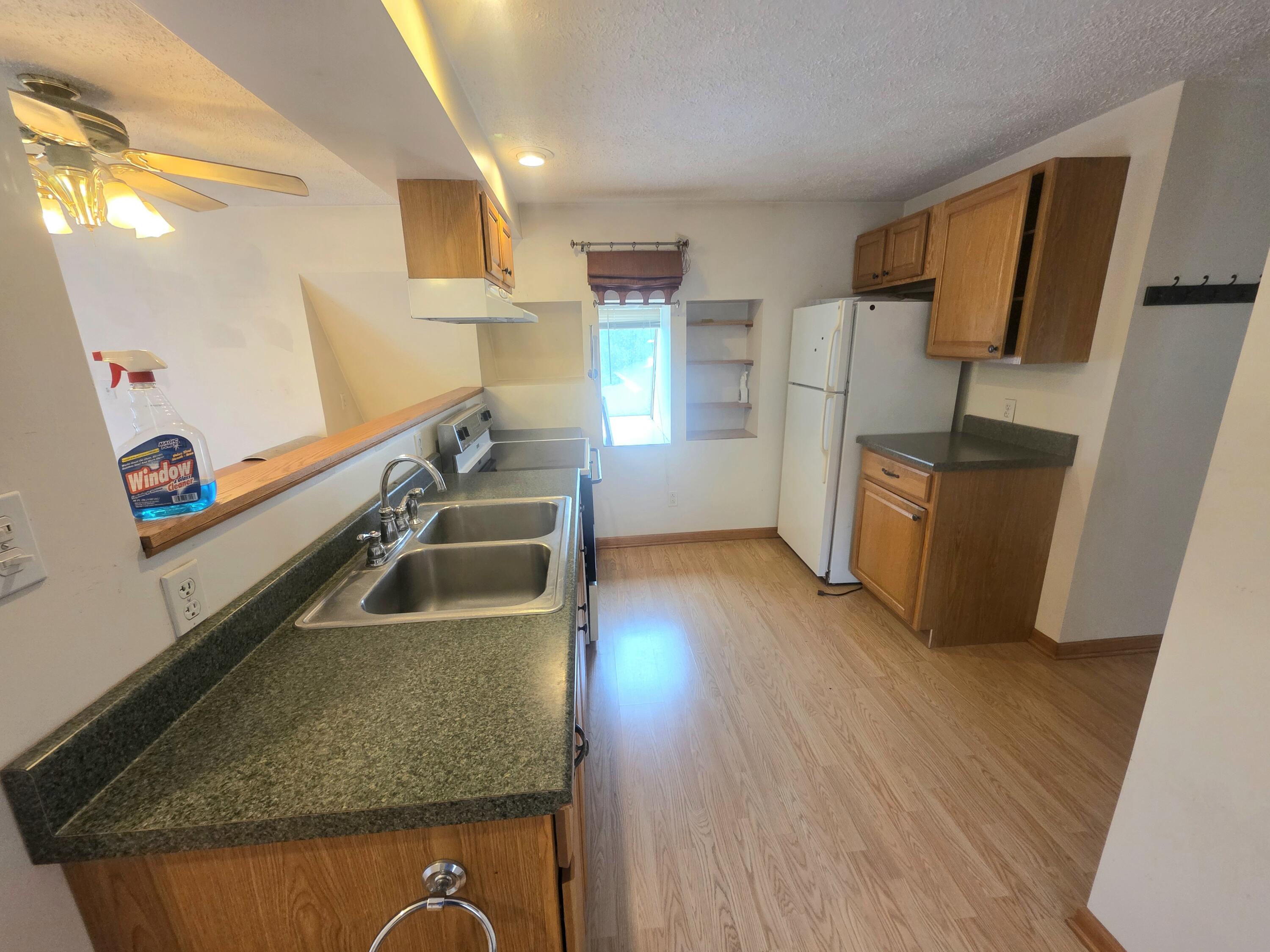 1402 Deaner Road Northeast Edmore, MI 48829 - Photo 8 of 17 Upper Kitchen