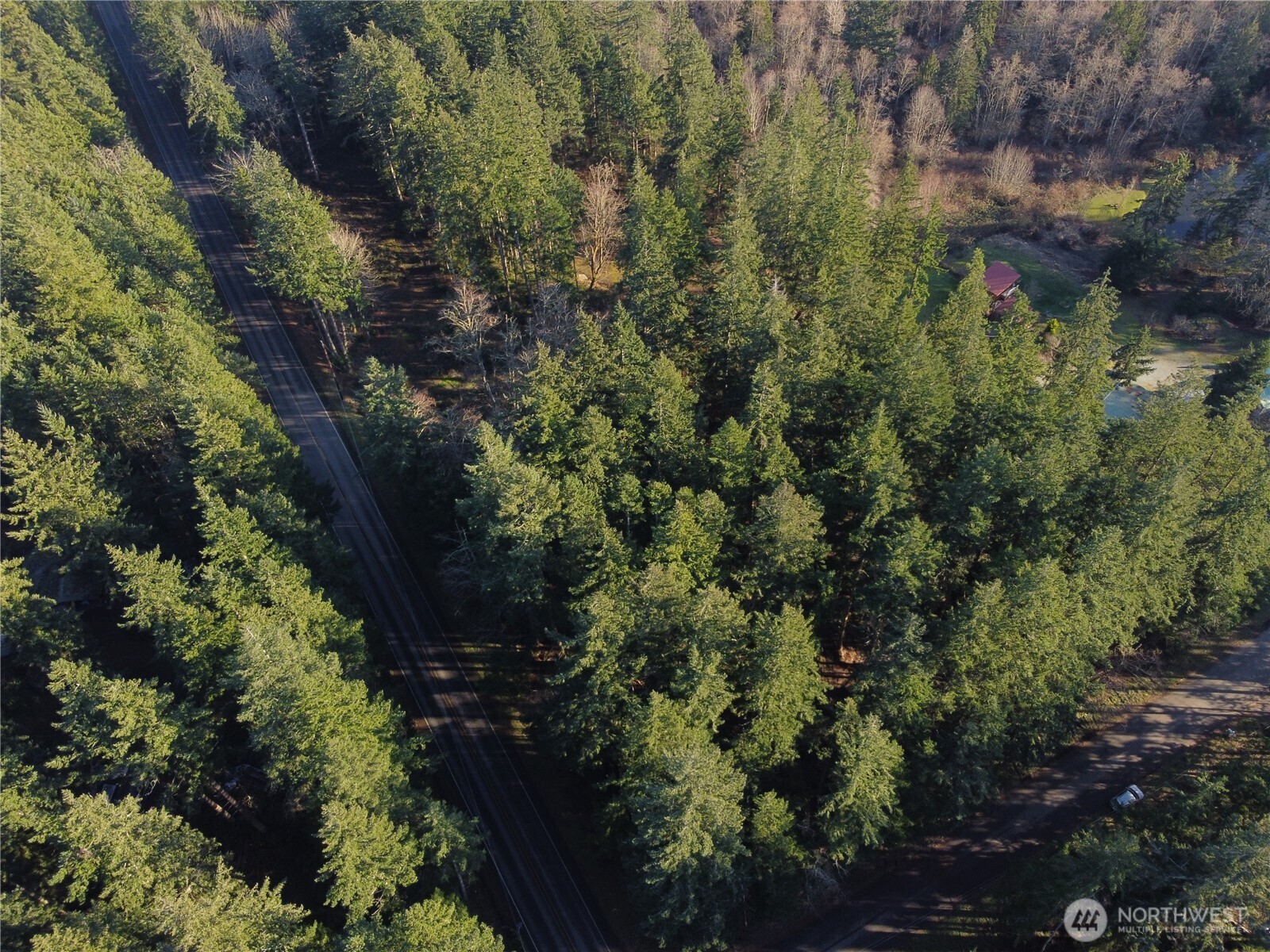 396 Durr Road Camano Island, WA 98282 - Photo 7 of 9 a view of a house with a yard