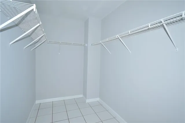 a view of an empty walk in closet