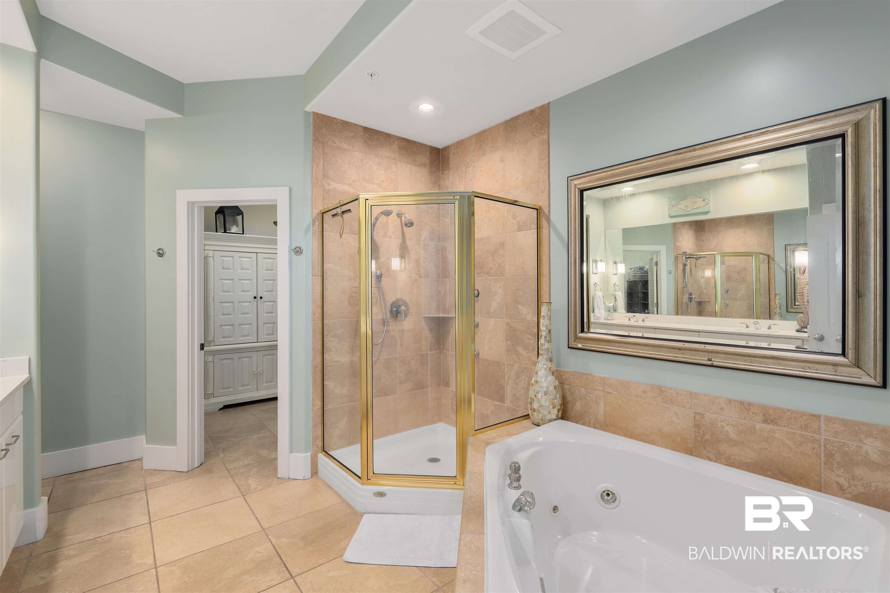 28107 Perdido Beach Boulevard, Unit DPH06 Orange Beach, AL 36561 - Photo 16 of 70 Bathroom with plus walk in shower, tile patterned flooring, and vanity