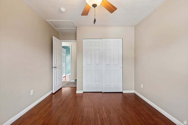 11798 Spiraea Way Draper, UT 84020 - Photo 11 of 21 Interior room with wood-finish flooring, neutral wall paint, and white trim