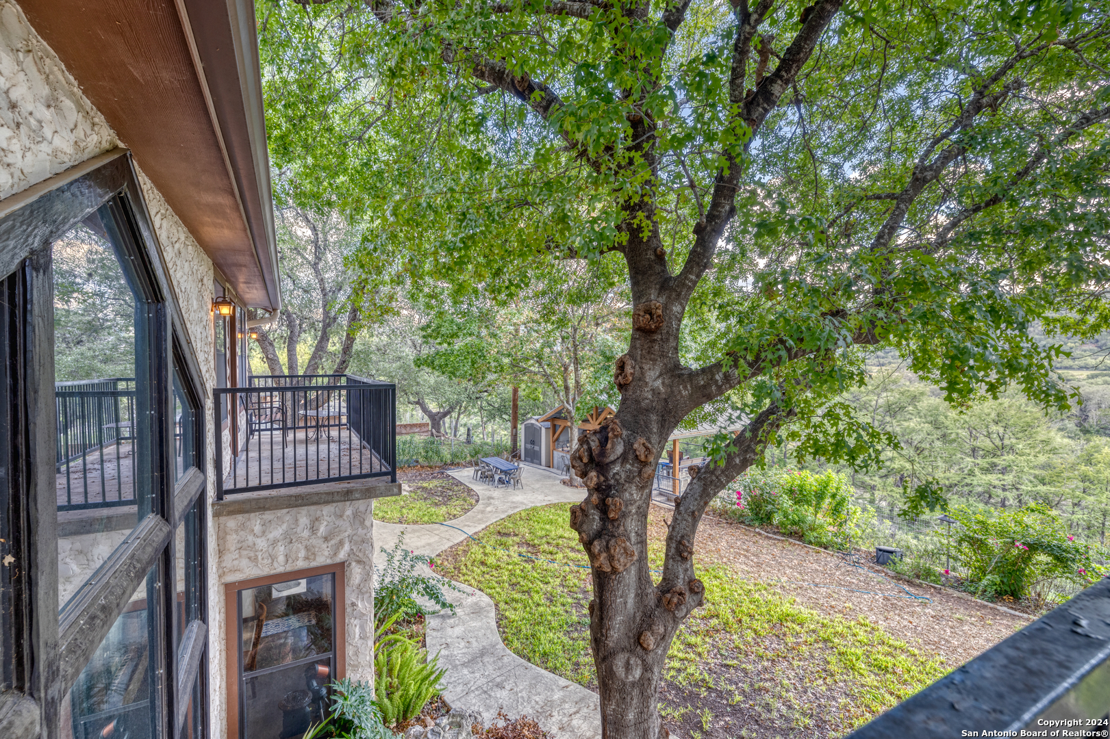 1242 River Road Concan, TX 78838 - Photo 22 of 42 a view of swimming pool with outdoor seating