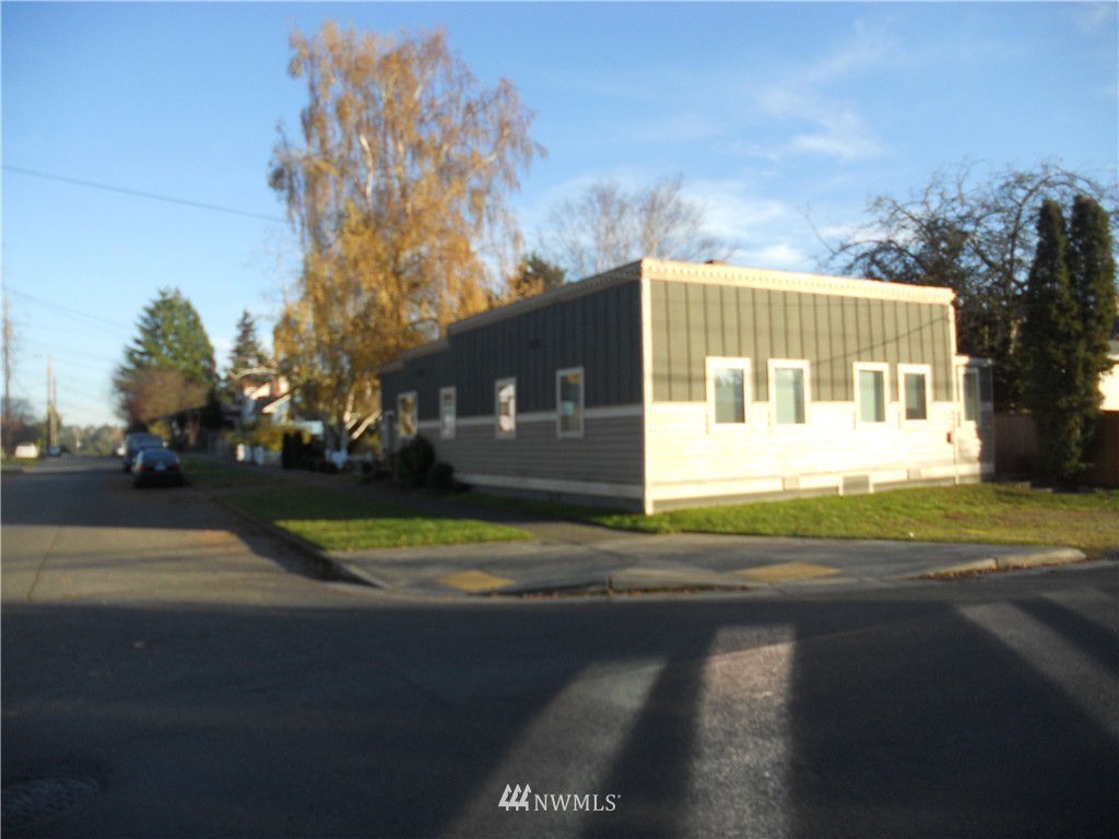 705 North 88th Street Seattle, WA 98103 - Photo 2 of 22 a view of a house with a yard