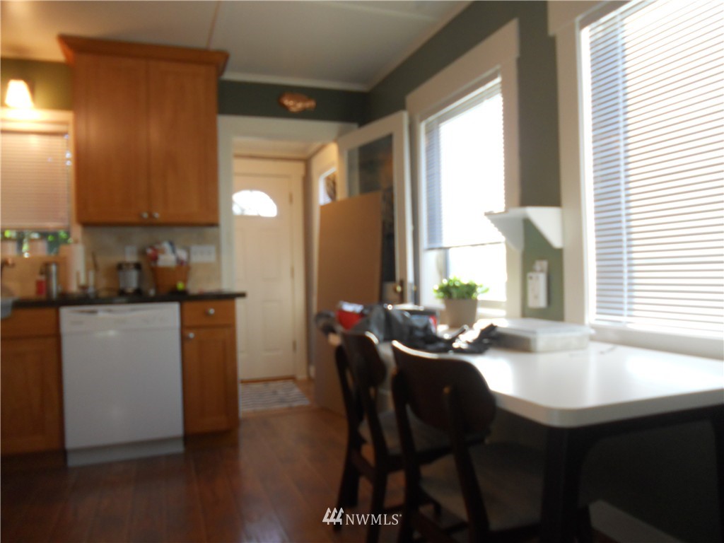 705 North 88th Street Seattle, WA 98103 - Photo 6 of 22 a dining room with furniture and window