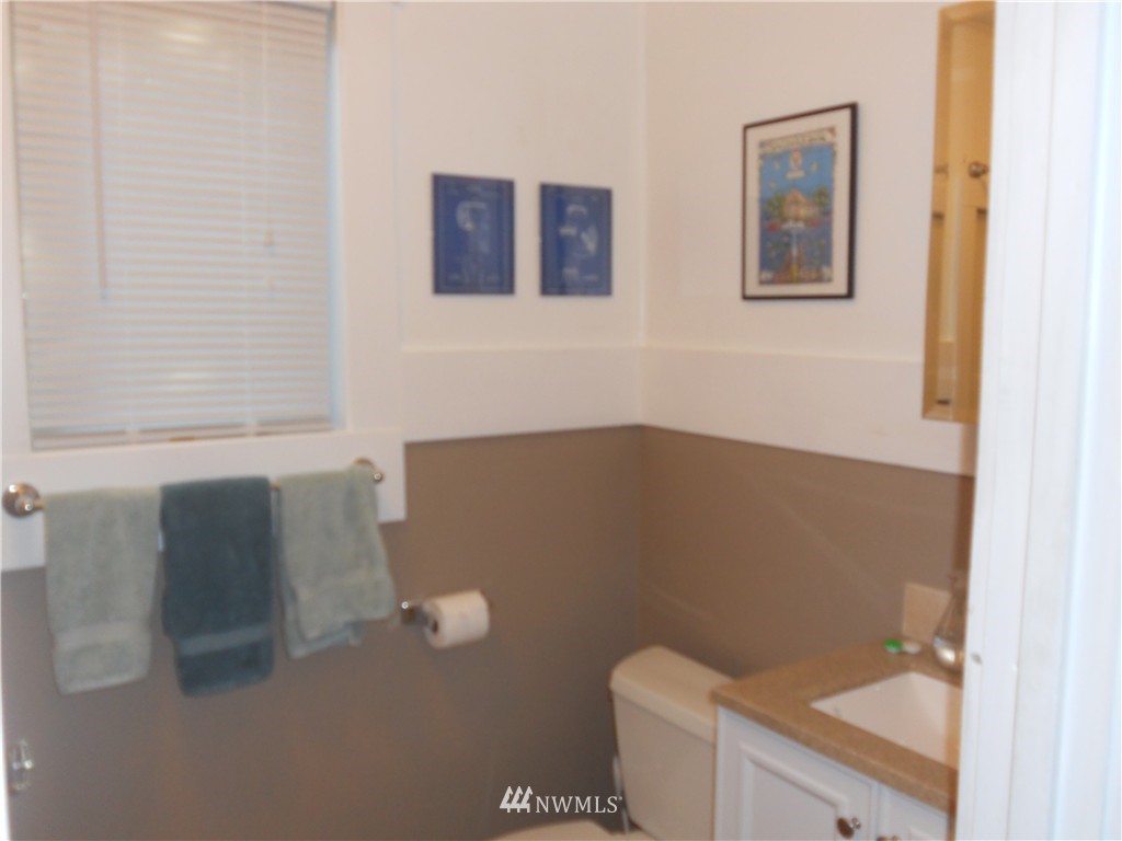 705 North 88th Street Seattle, WA 98103 - Photo 10 of 22 a bathroom with a toilet