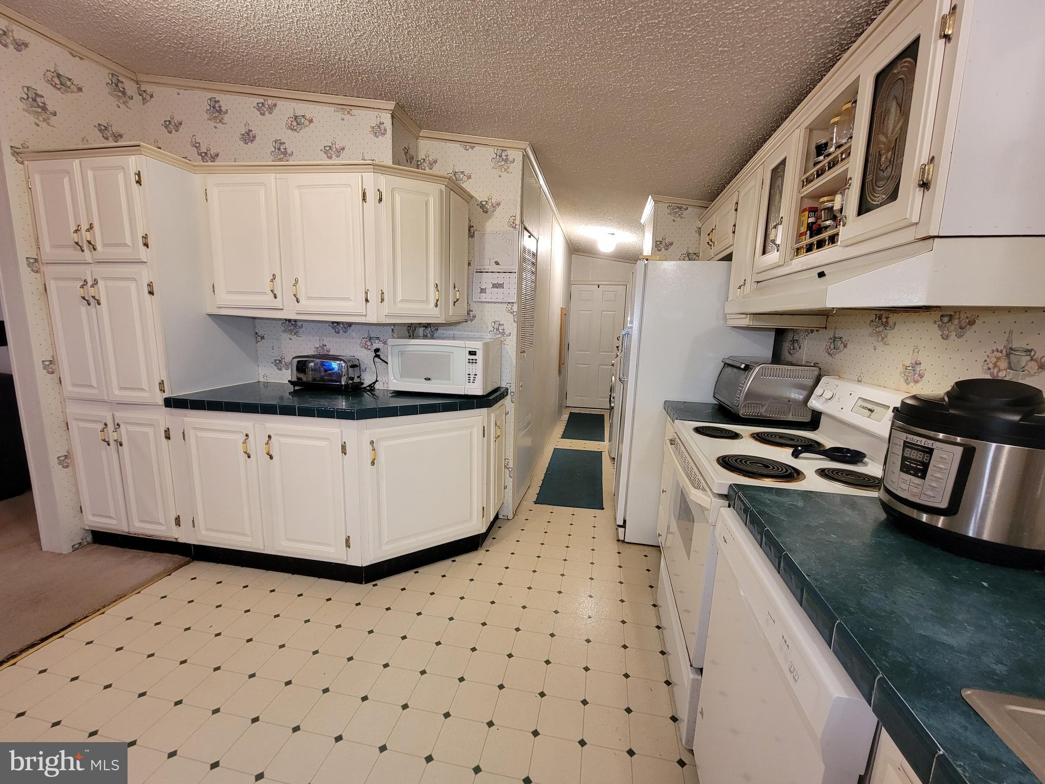 6527 Gravel Branch Road Hurlock, MD 21643 - Photo 24 of 58 Kitchen view into laundry