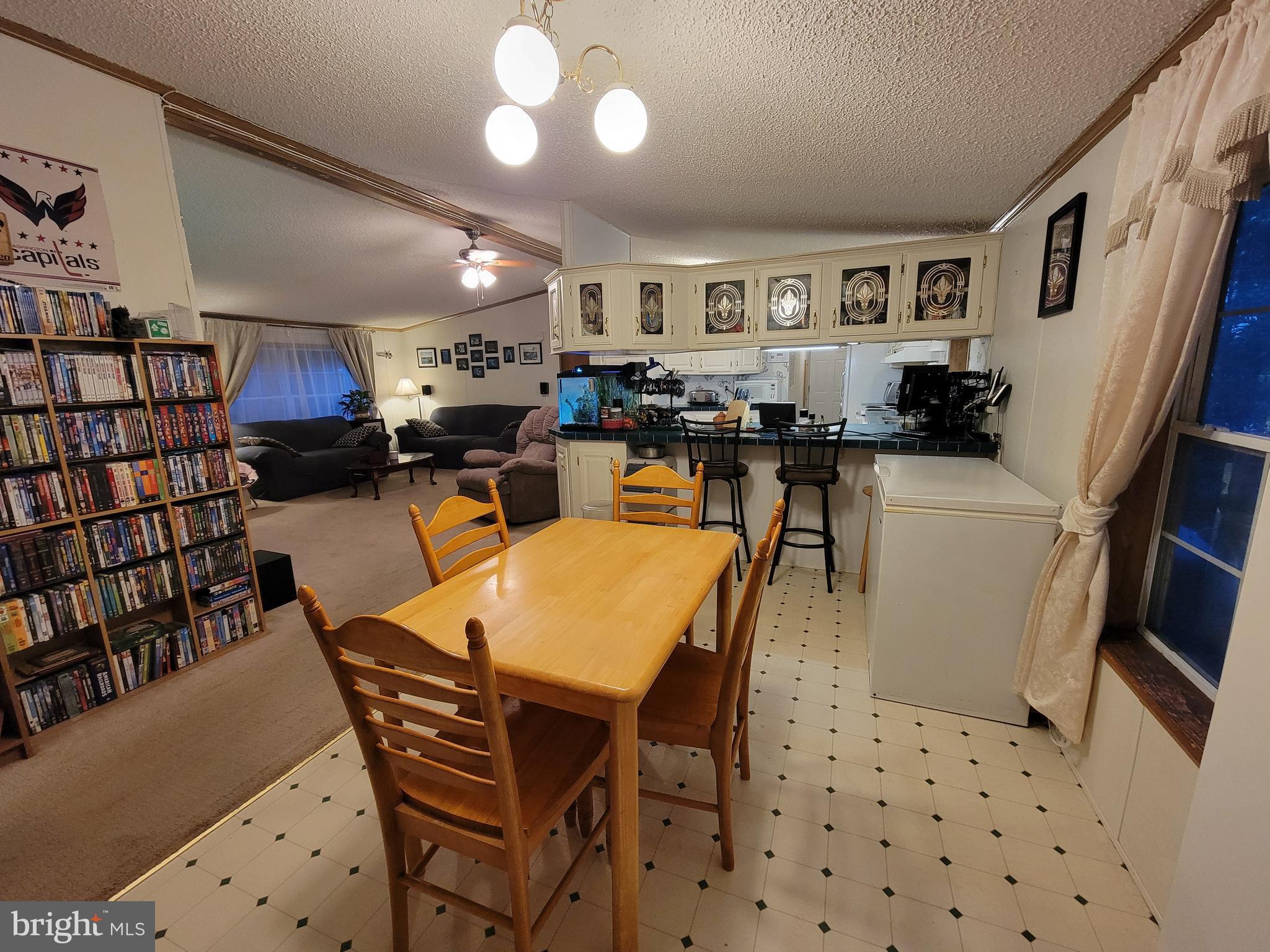 6527 Gravel Branch Road Hurlock, MD 21643 - Photo 29 of 58 Dining area overlooking kitchen and living