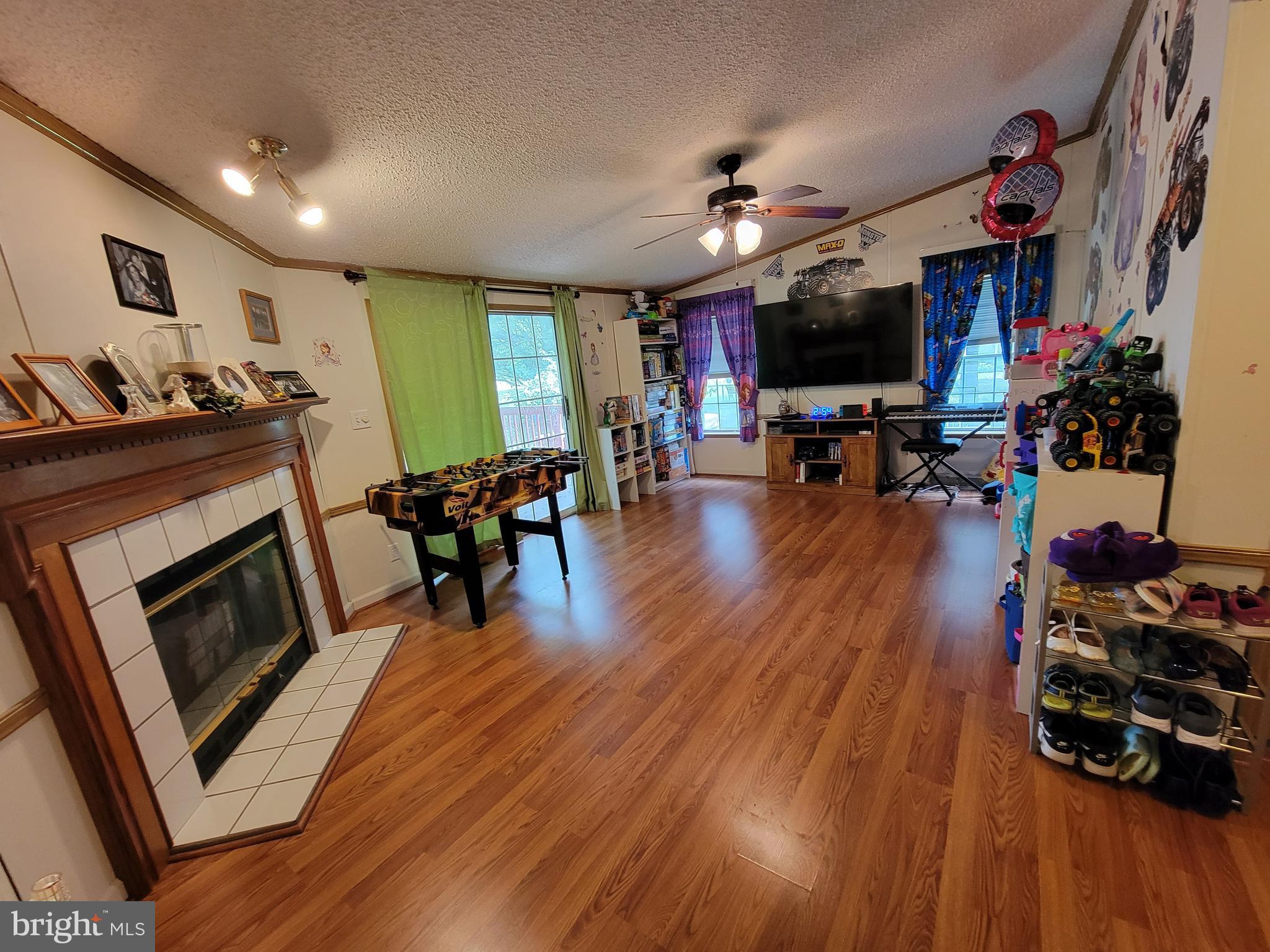 6527 Gravel Branch Road Hurlock, MD 21643 - Photo 43 of 58 Family room with door to deck