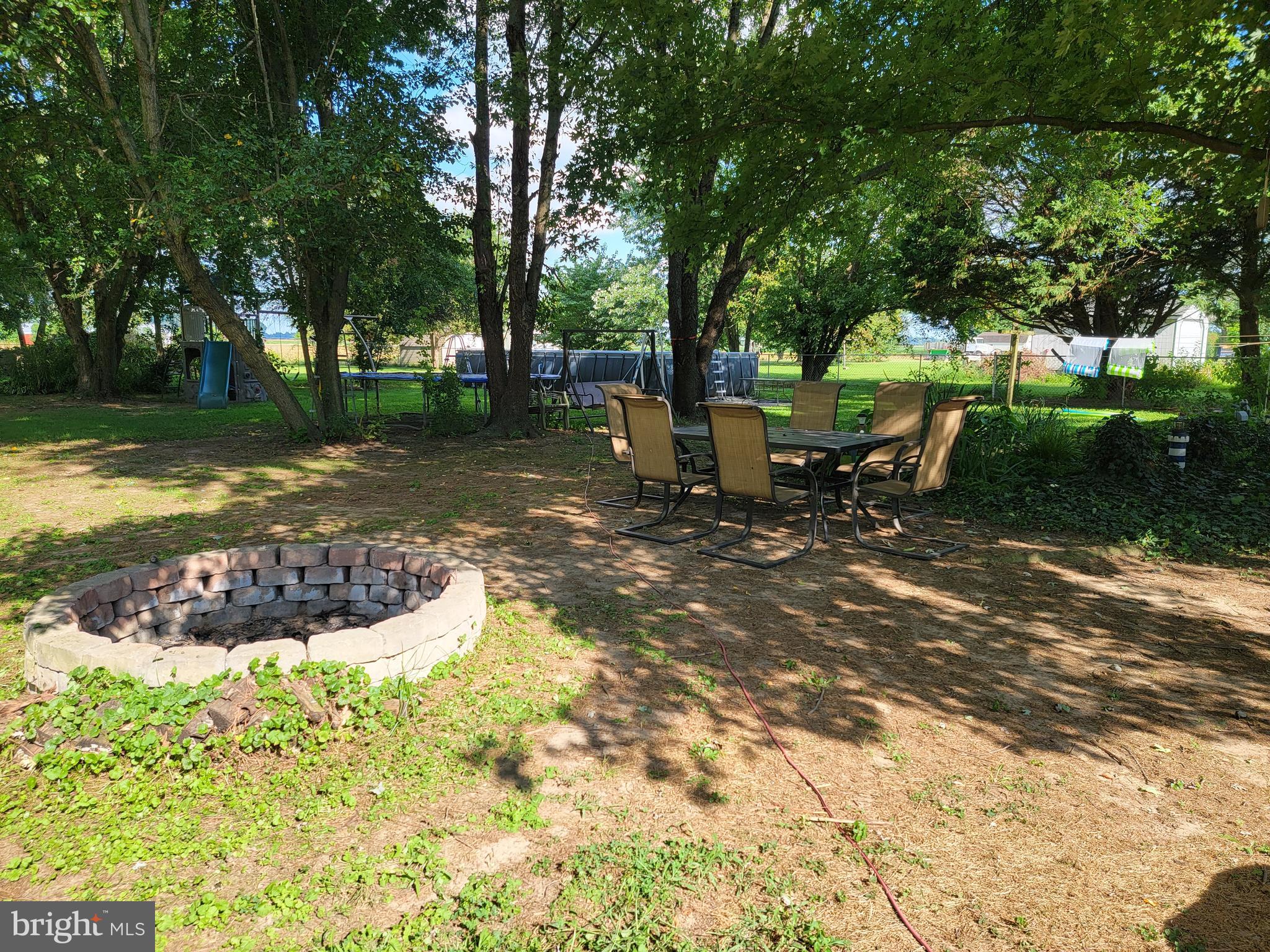 6527 Gravel Branch Road Hurlock, MD 21643 - Photo 9 of 58 Backyard with firepit