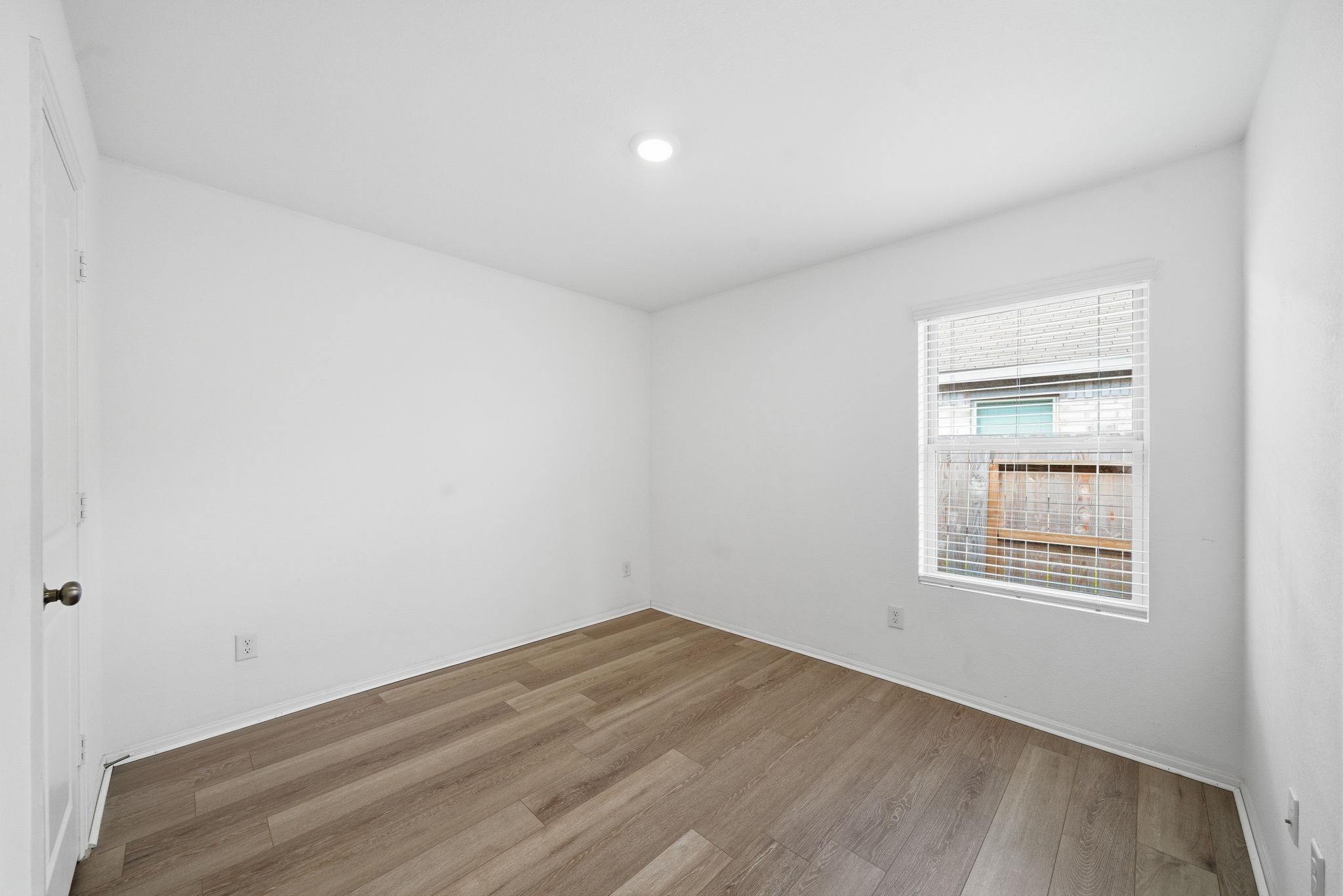 7335 Greenbriar Cyn Lane Katy, TX 77493 - Photo 5 of 10 an empty room with a window