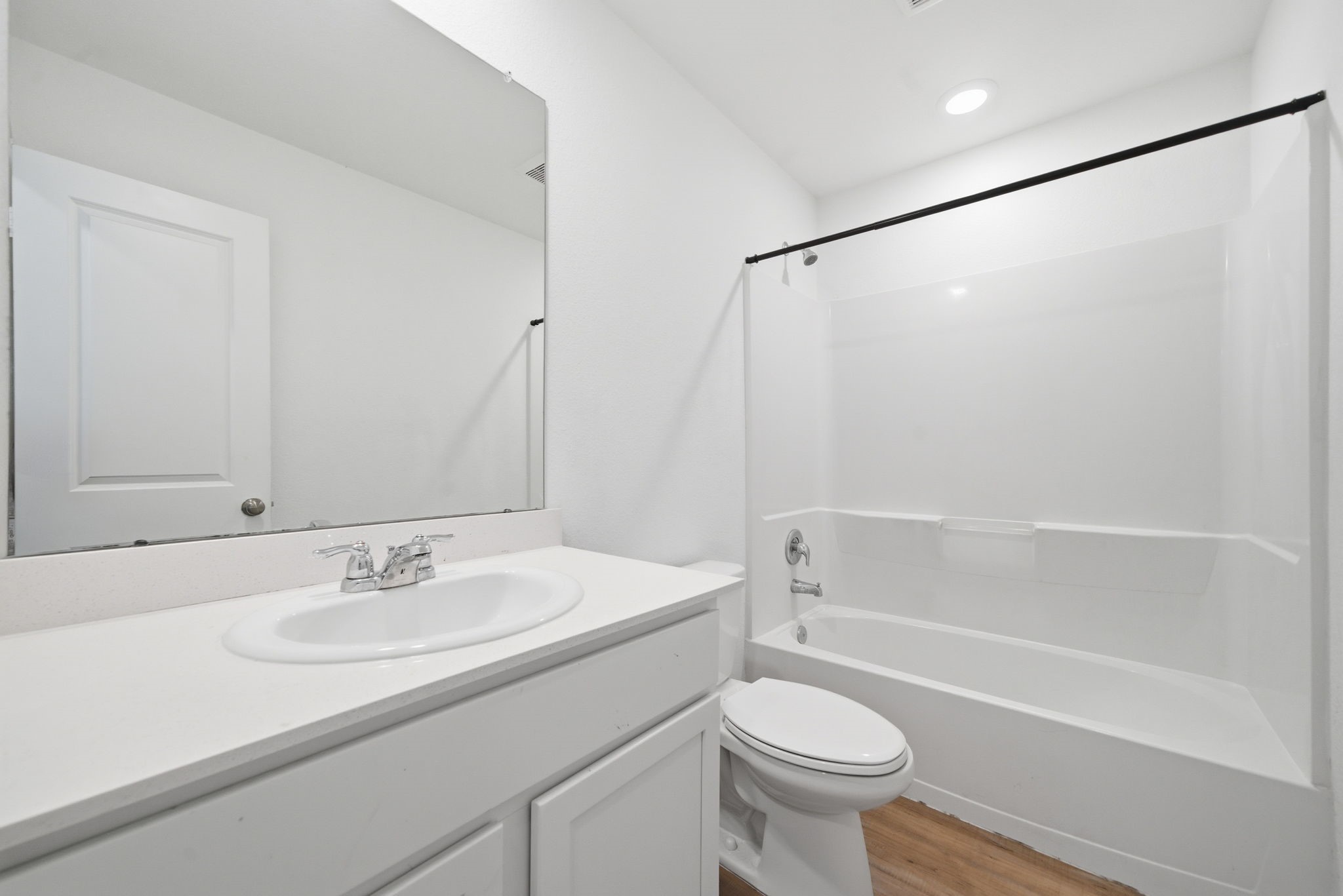 7335 Greenbriar Cyn Lane Katy, TX 77493 - Photo 8 of 10 a bathroom with a sink toilet and a bathtub