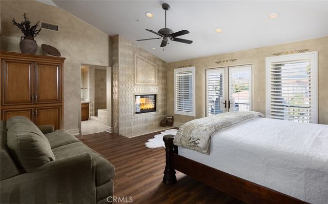 a bathroom with a tub a sink and shower
