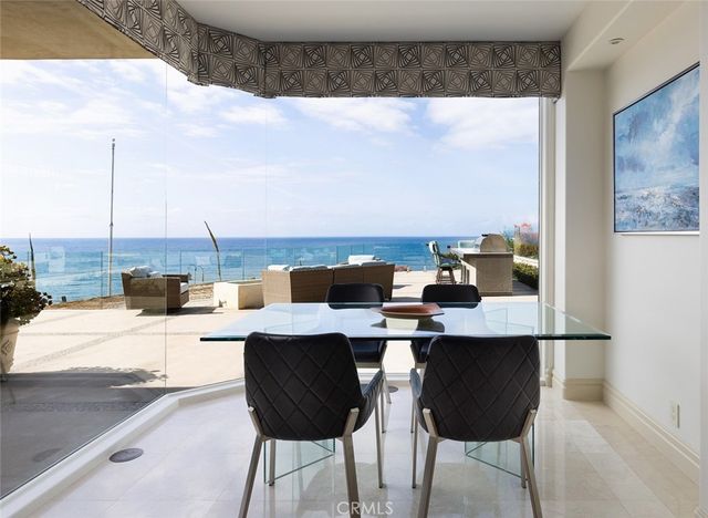 a view of balcony with furniture