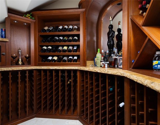 a bathroom with a granite countertop sink mirror and double