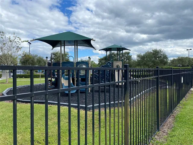 a view of a balcony with sitting space