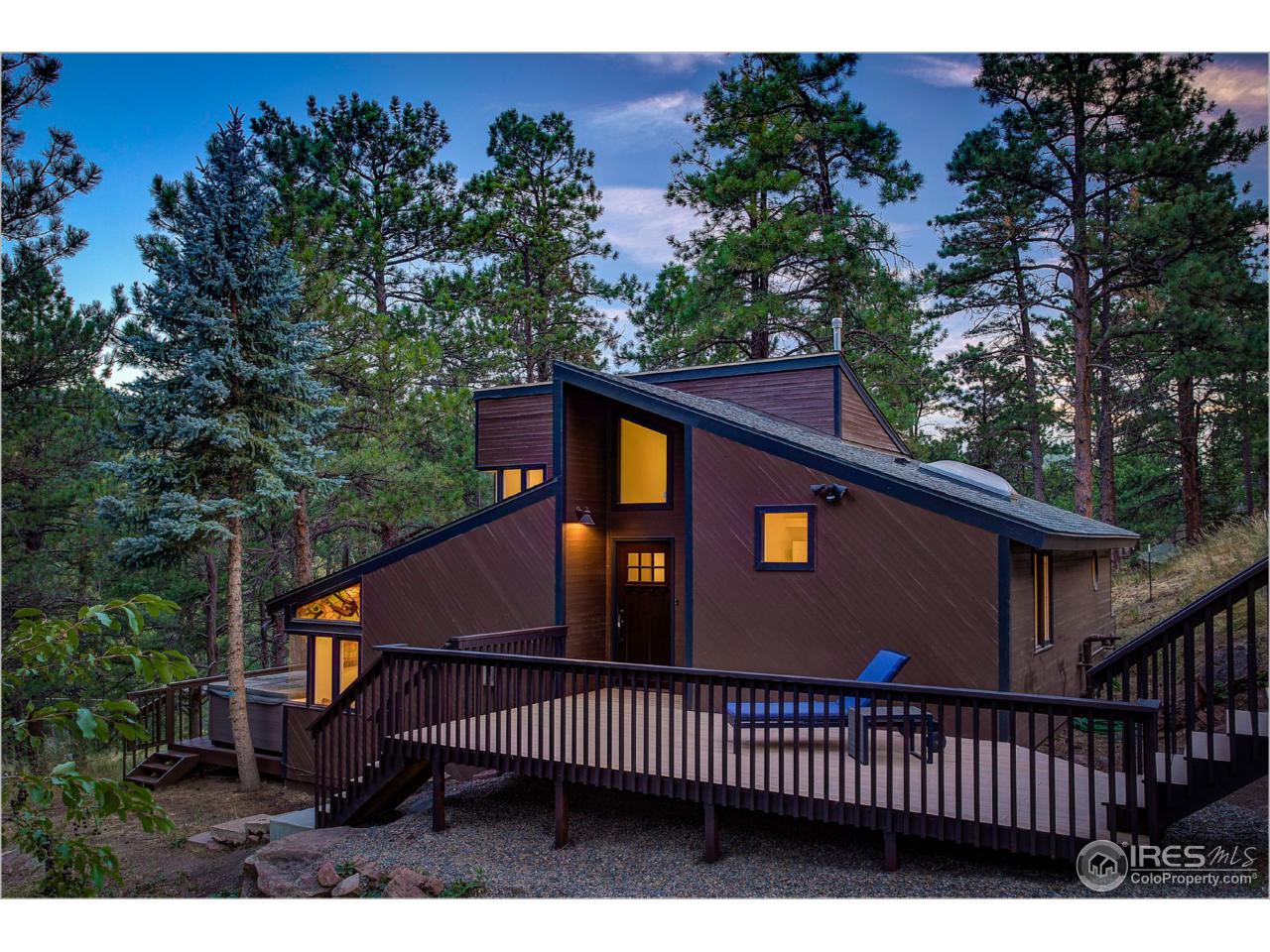 765 Pine Brook Road Boulder, CO 80304 - Photo 2 of 37 a view of a roof deck with wooden fence and floor