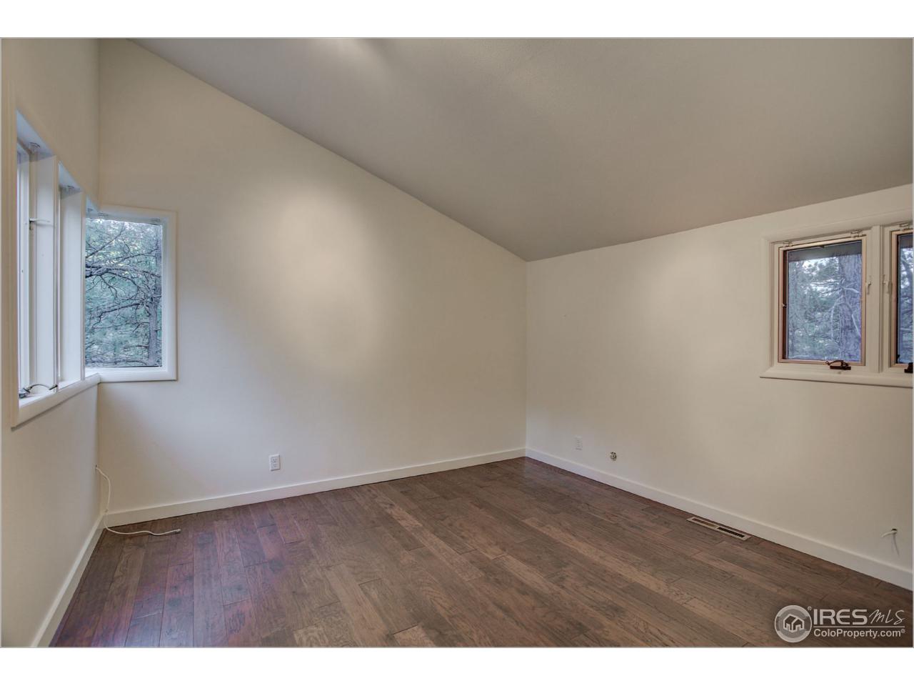 765 Pine Brook Road Boulder, CO 80304 - Photo 23 of 37 a view of an empty room and window
