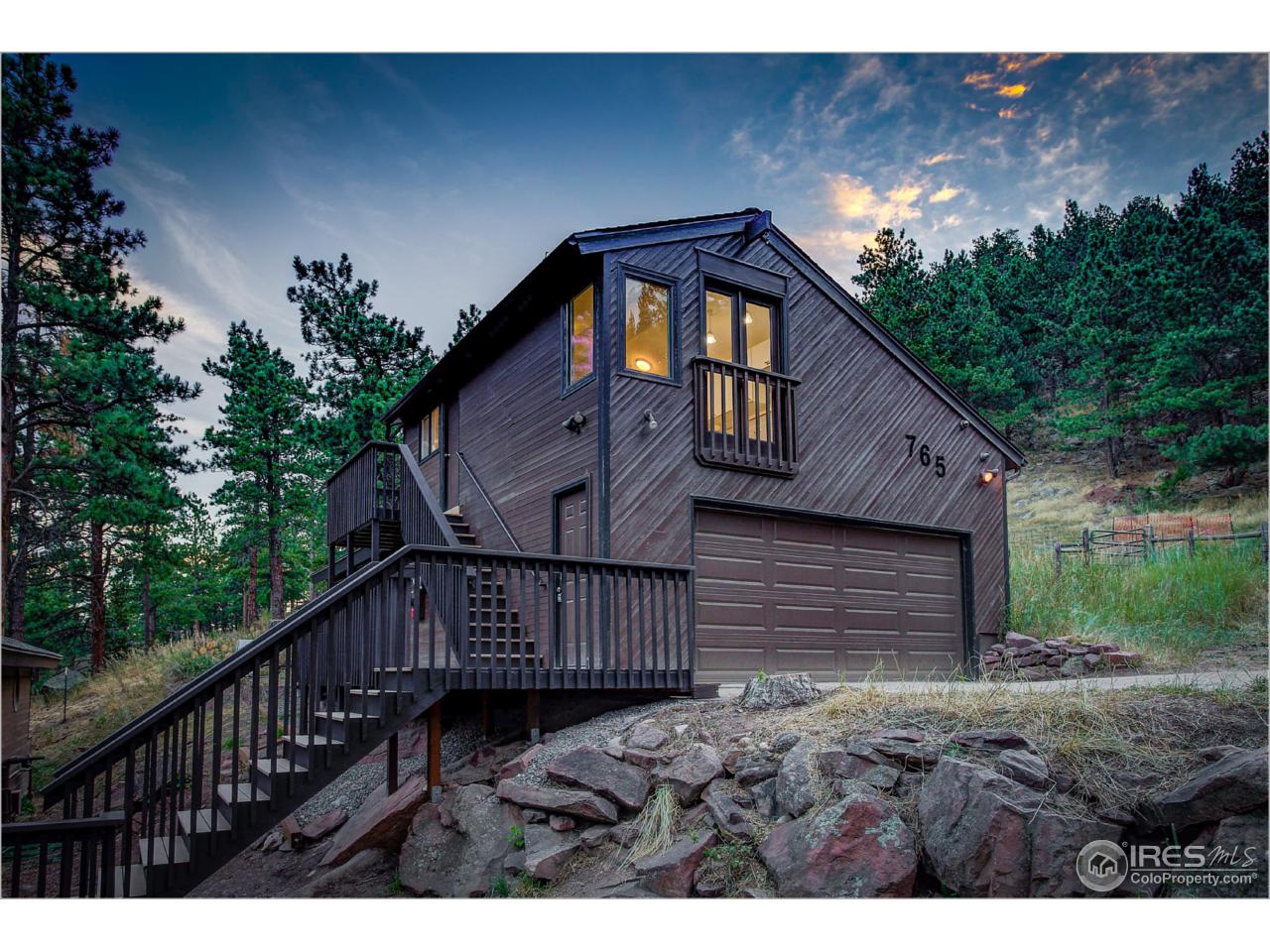 765 Pine Brook Road Boulder, CO 80304 - Photo 5 of 37 a view of a house with a yard