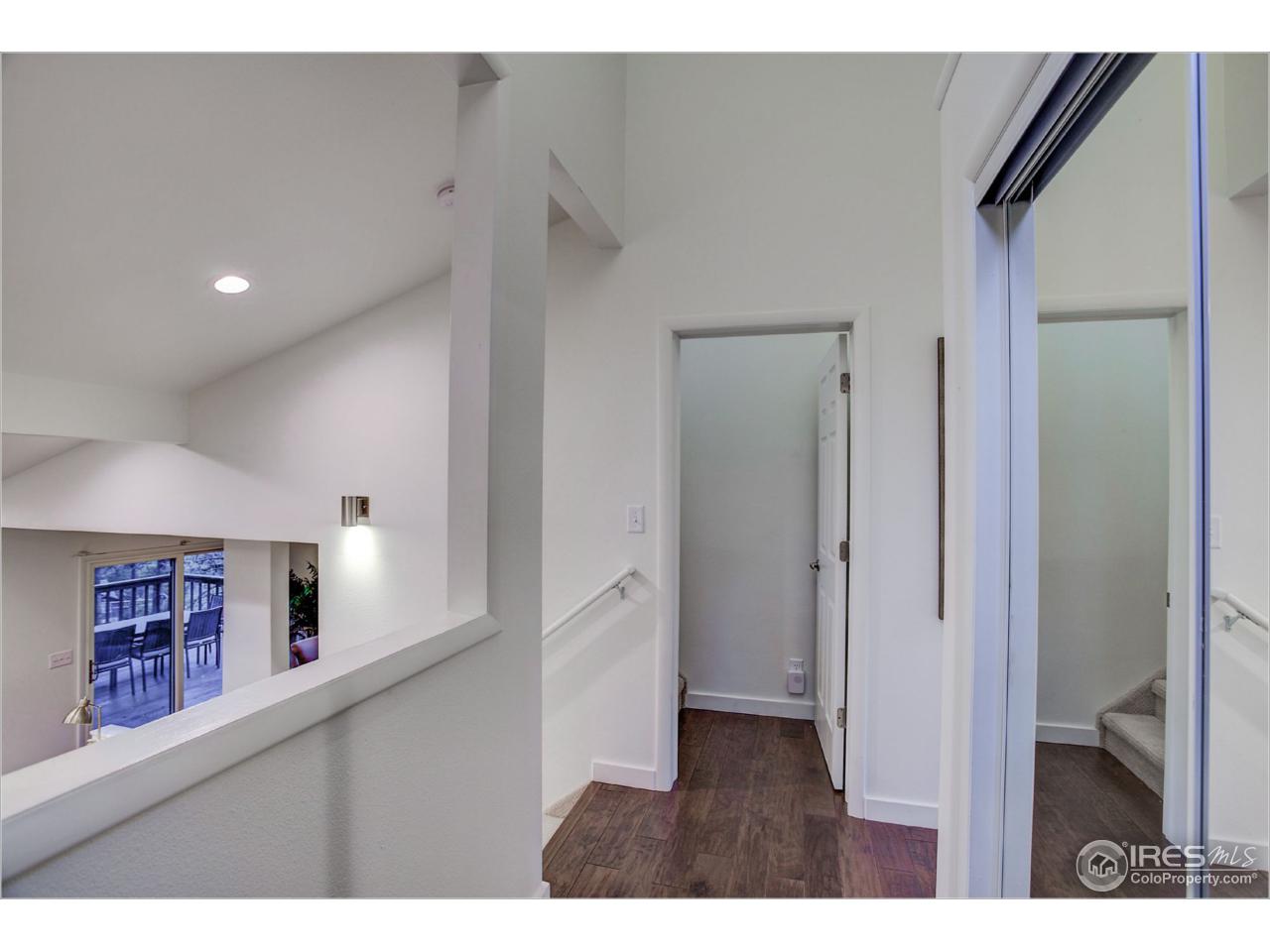 765 Pine Brook Road Boulder, CO 80304 - Photo 9 of 37 a view of an entryway with wooden floor