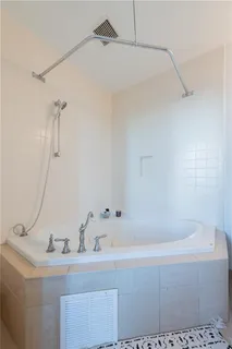a bathroom with a sink and a bathtub