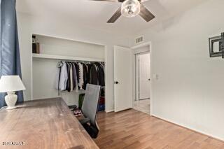 115 West 10th Street Tempe, AZ 85281 - Photo 16 of 19 a view of walk in closet with clothes and shoes