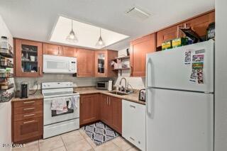 115 West 10th Street Tempe, AZ 85281 - Photo 2 of 19 a white refrigerator freezer sitting in a kitchen