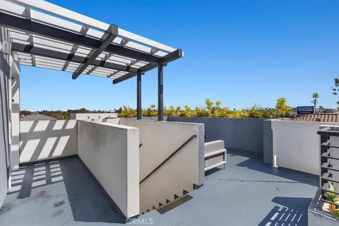 a view of a chairs and table on the terrace