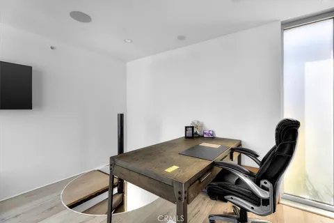 a view of a workspace with furniture