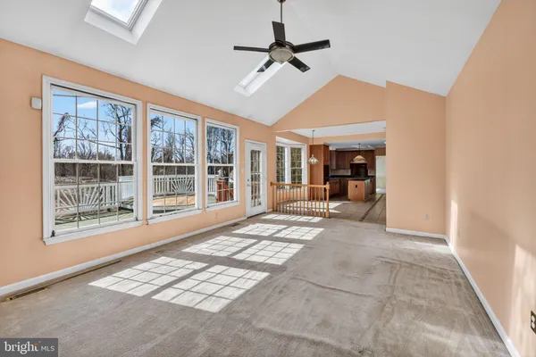 a view of livingroom with furniture and windows