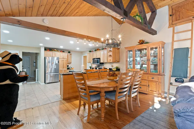 a view of livingroom with furniture and white walls