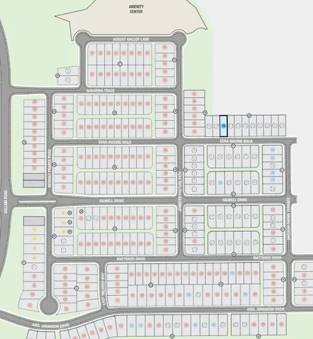 an aerial view of a swimming pool with a yard and outdoor seating